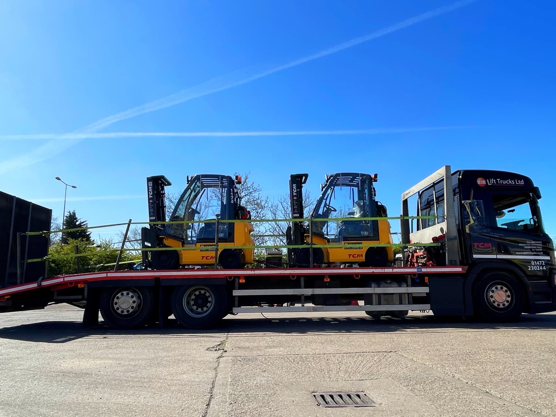BJB's lorry delivering the trucks to Grimsby Docks.