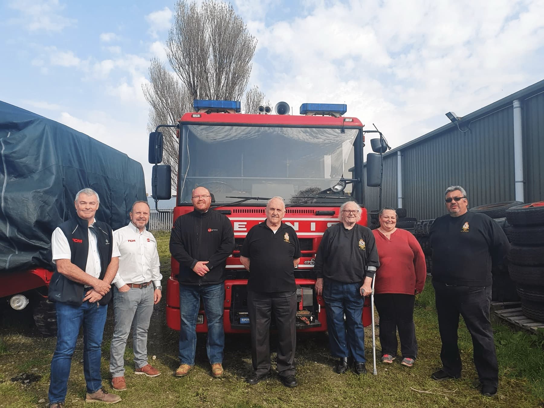 The BJB team with the museum's volunteers.