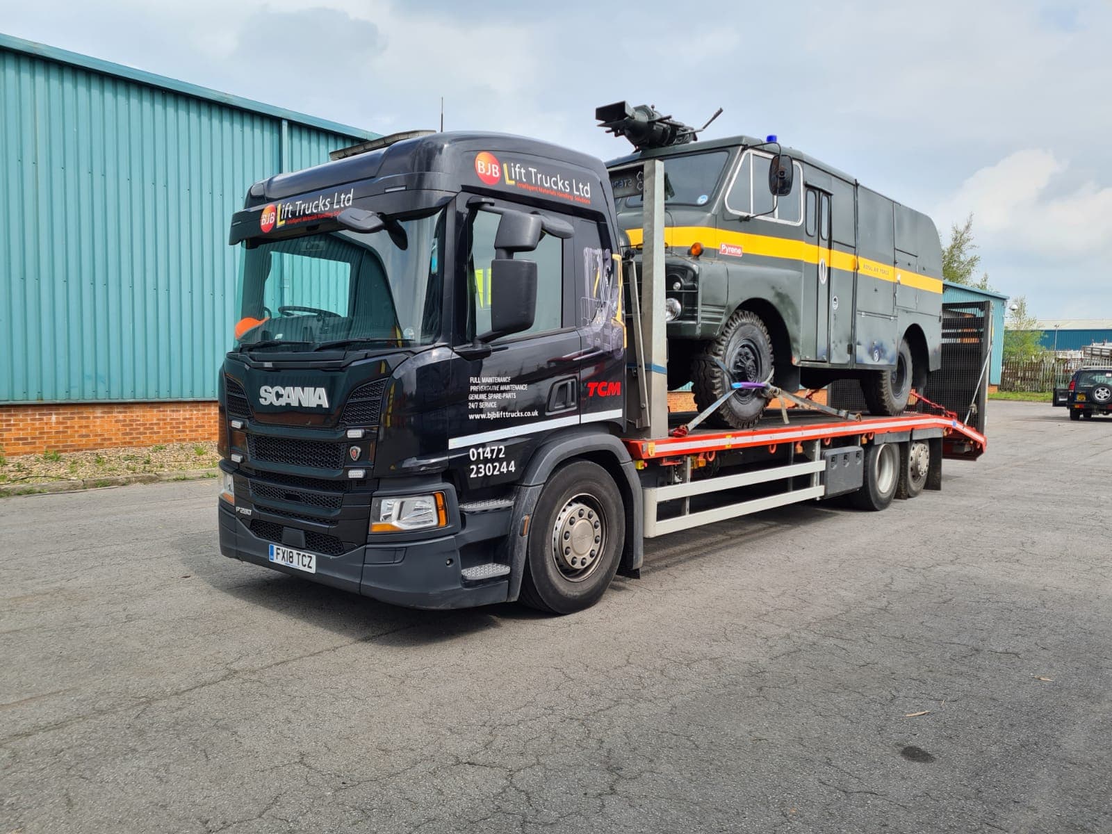 BJB's Scania HGV loaded with museum equipment.
