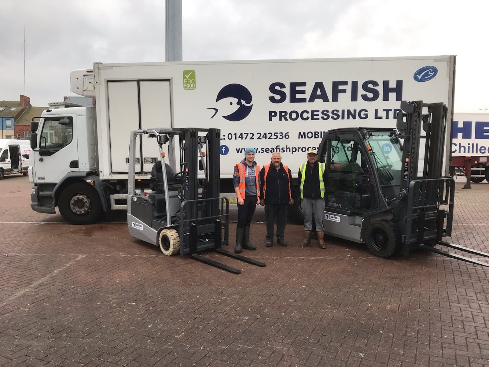 The Seafish Processing team with their new TCM forklifts.