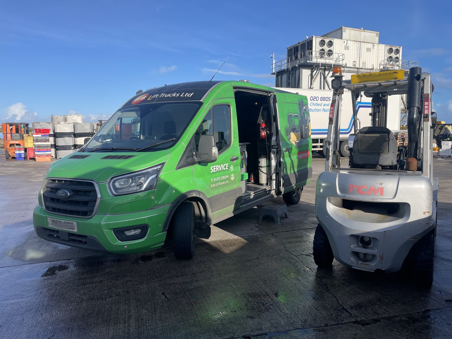A BJB service van alongside a forklift on a customer's site.